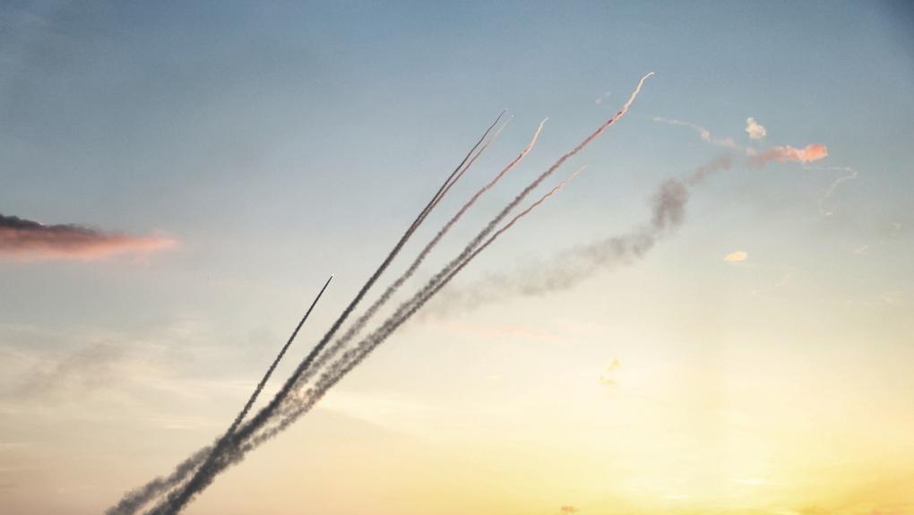 Israel intercepts rocket from Gaza as 17 killed near food distribution site