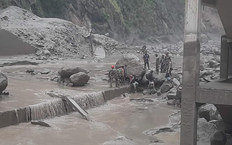 Flash floods wash away Nepal-China trade route, leave 8 dead
