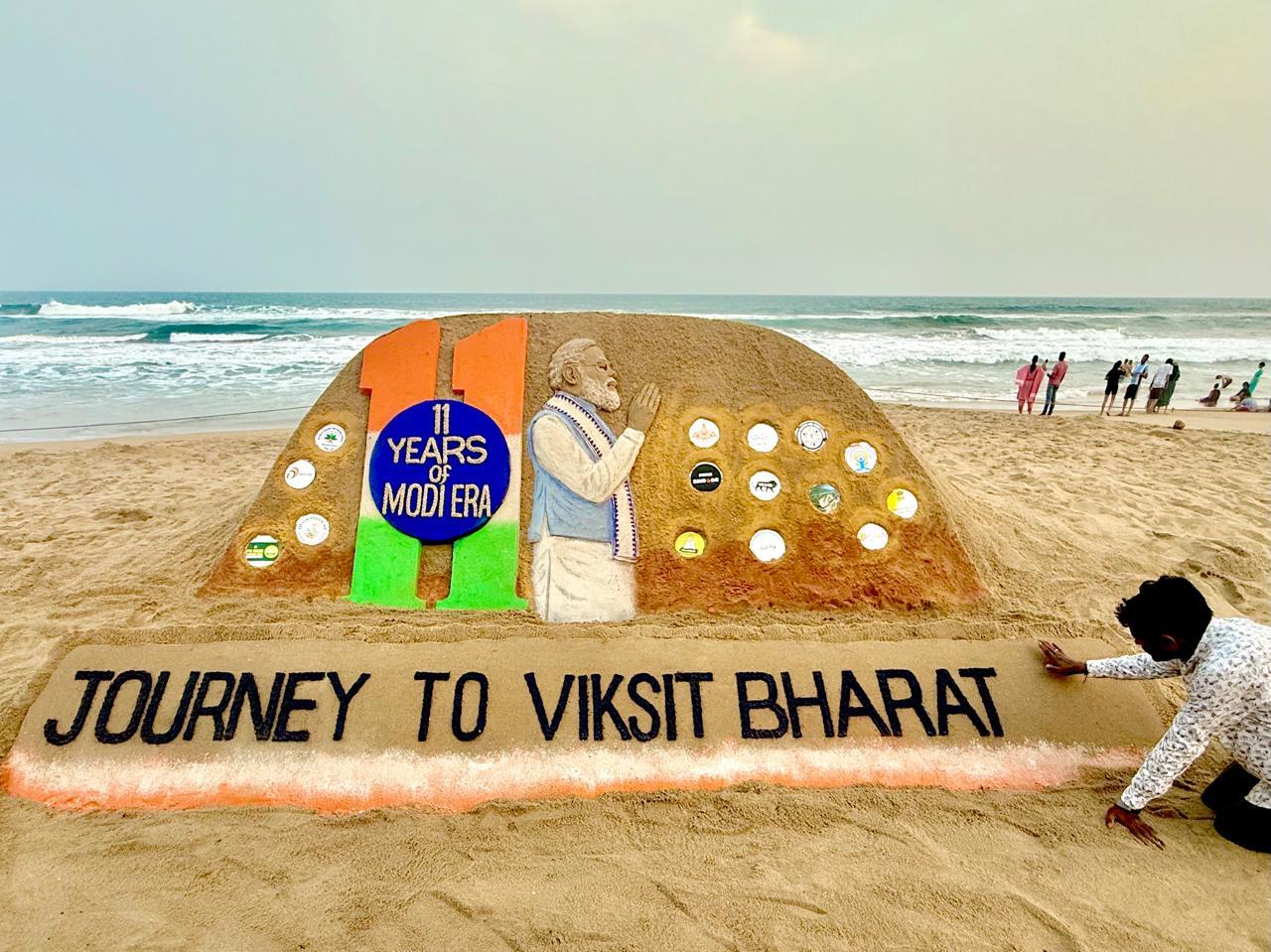 Sand artist Sudarsan Pattnaik congratulates PM Modi for completing 11 years in office