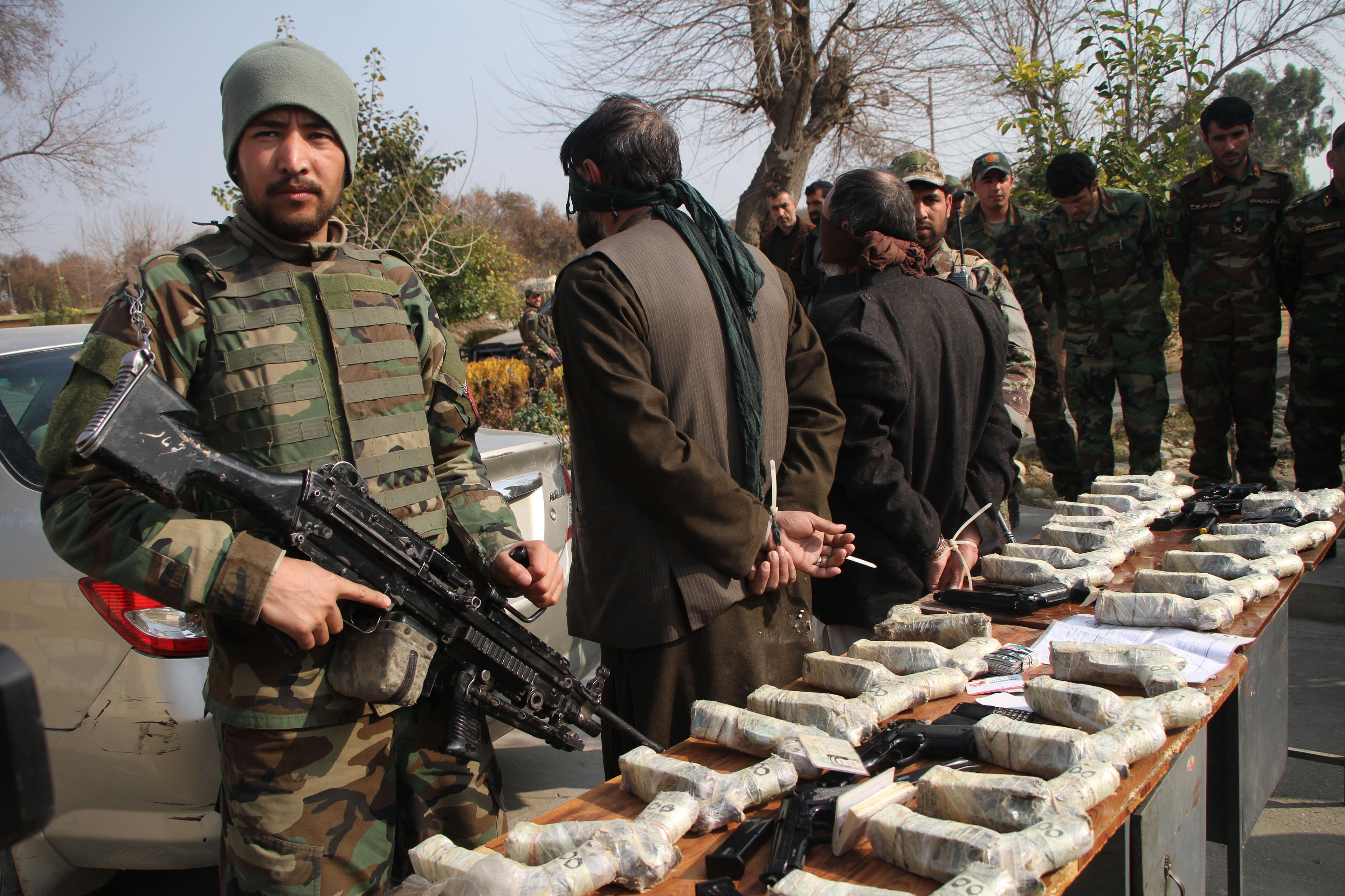 Afghan police confiscate weapons and ammunition cache, arrest suspects