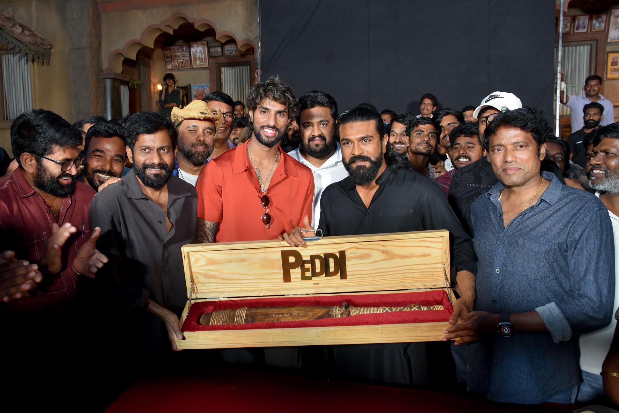Cricketer Tilak Varma visits sets of Ram Charan's 'Peddi'; Ram Charan gifts him the 'Peddi' cricket bat!