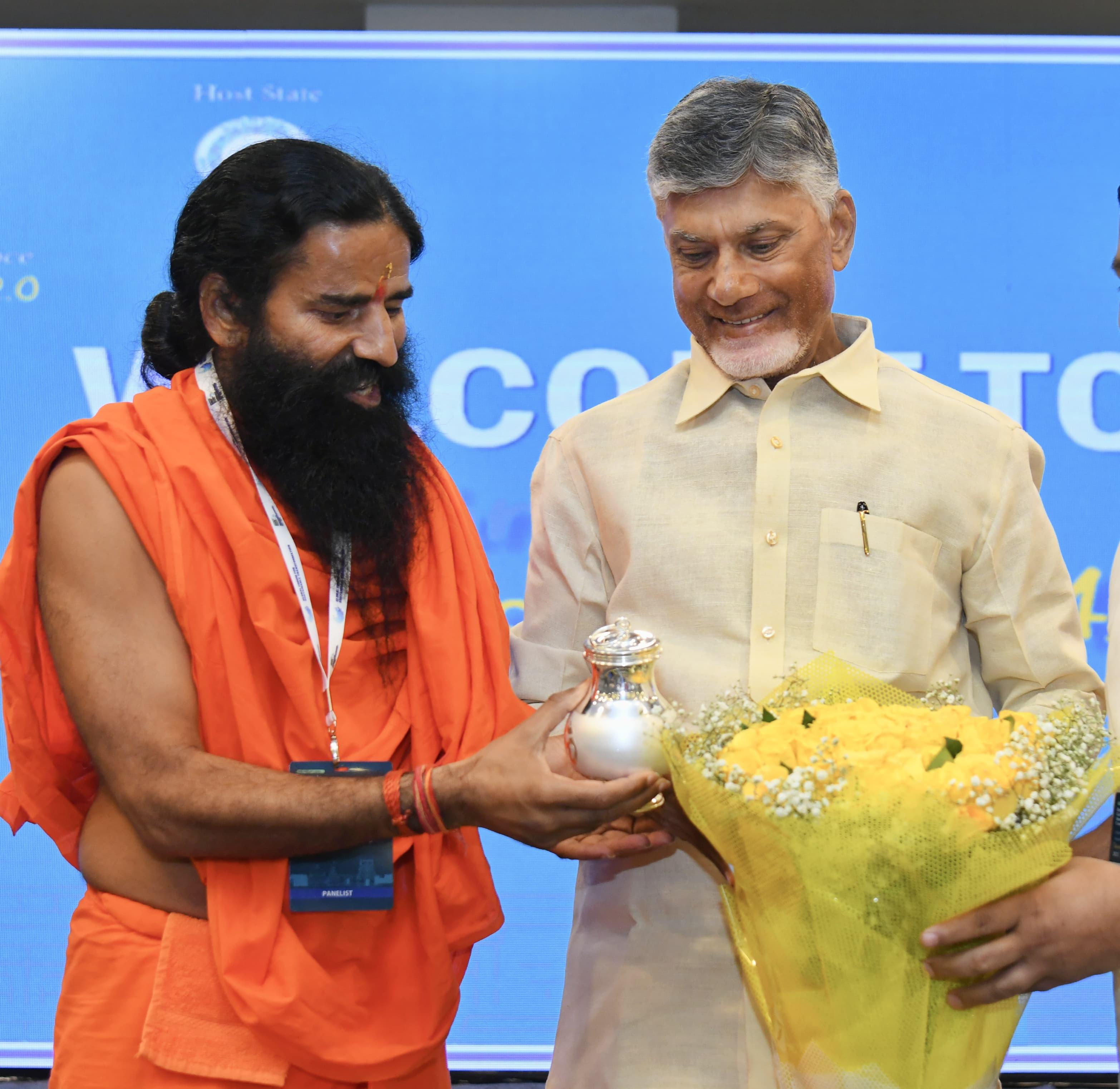 Andhra CM invites Baba Ramdev to promote wellness tourism