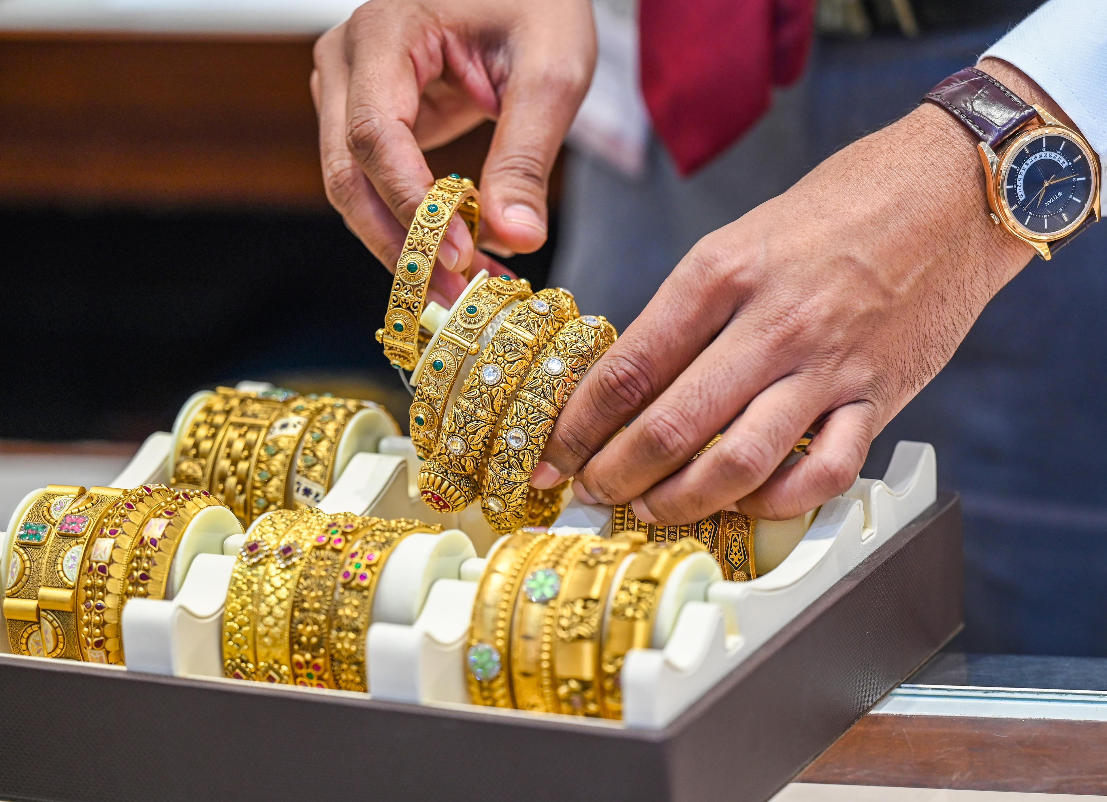 Gold, silver continue to touch new highs as US dollar weakens