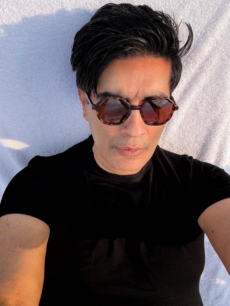 Manish Malhotra takes a rare break from work, recharges by the beach