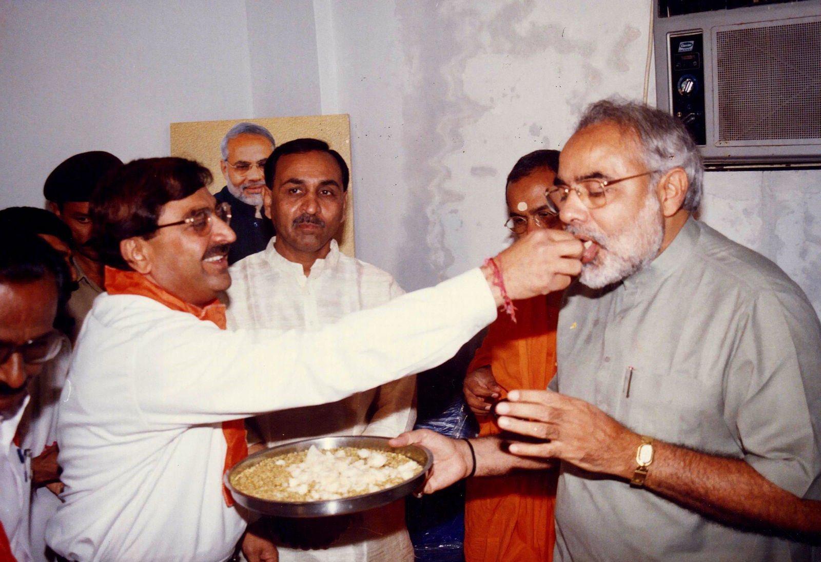 Through smiles, silence & sweets: The unspoken bond between PM Modi and Vijay Rupani