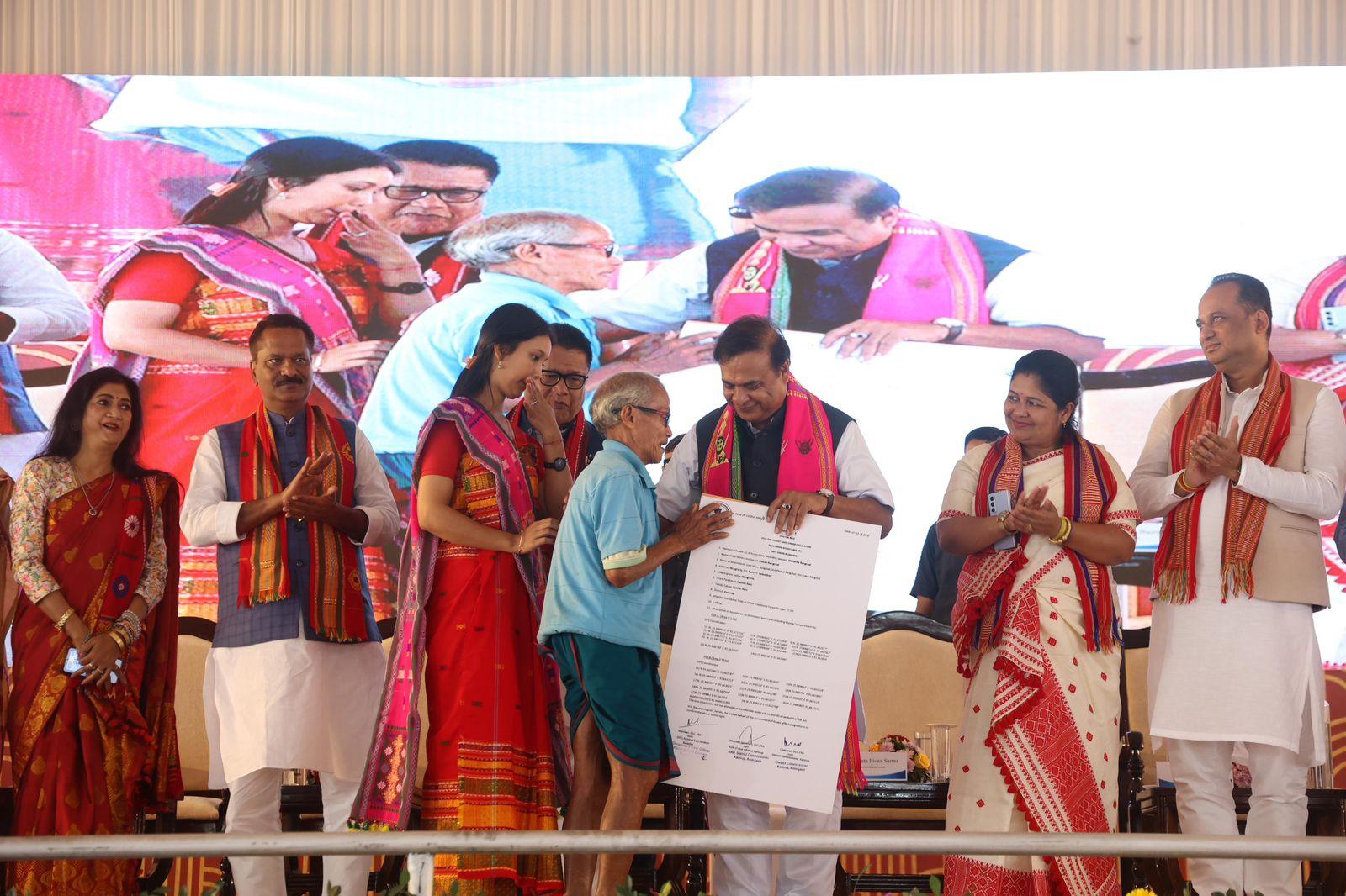 Assam CM hands over land titles to 4,673 tribal families