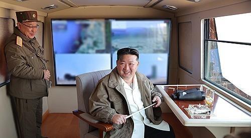 North Korea's Kim supervises test-firing of new air defence missiles