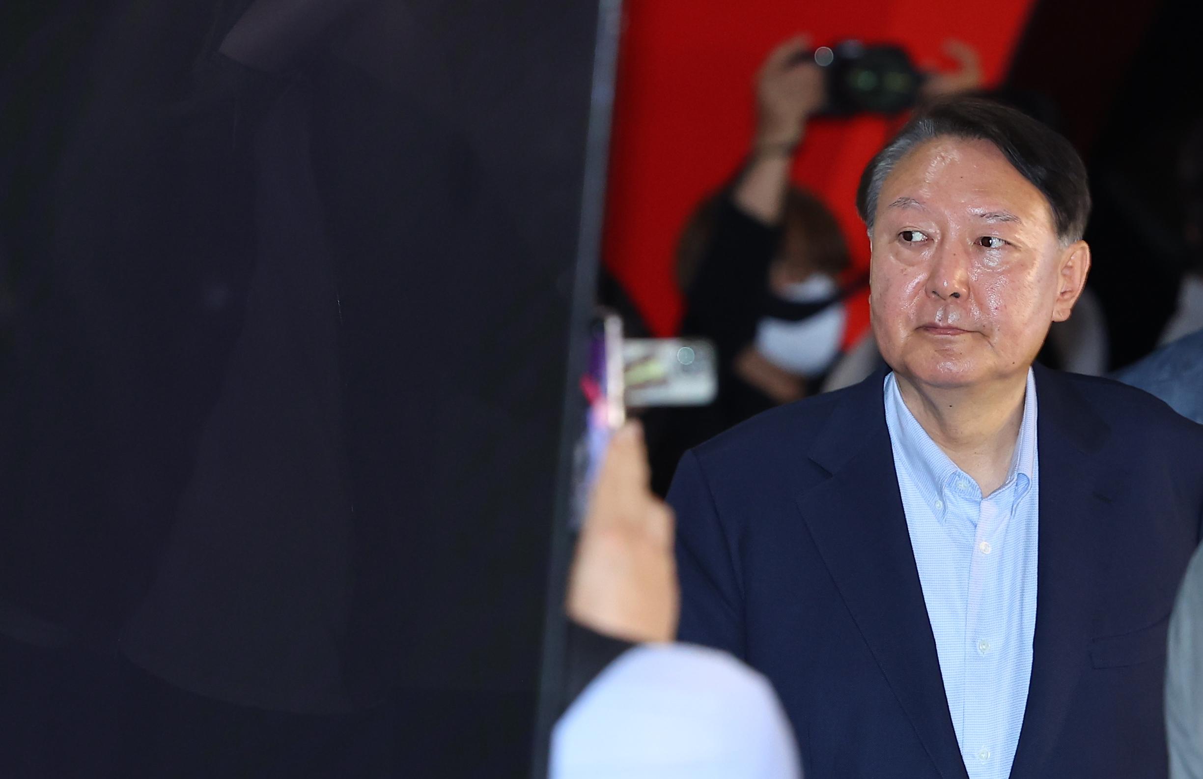 South Korea: Police seize ex-President Yoon's phones for first time since martial law bid