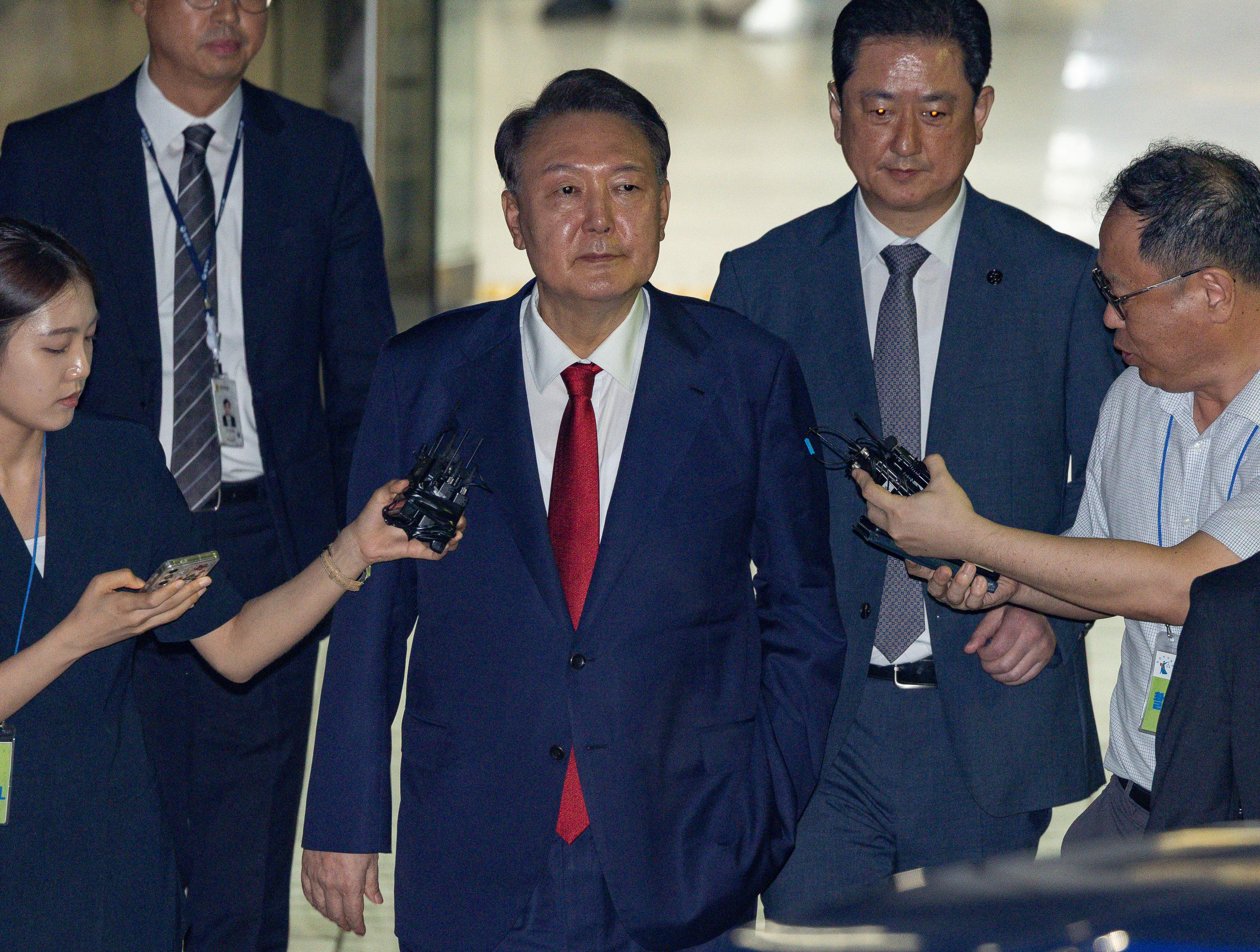 South Korea: Arrested ex-President Yoon skips insurrection trial hearing for 1st time