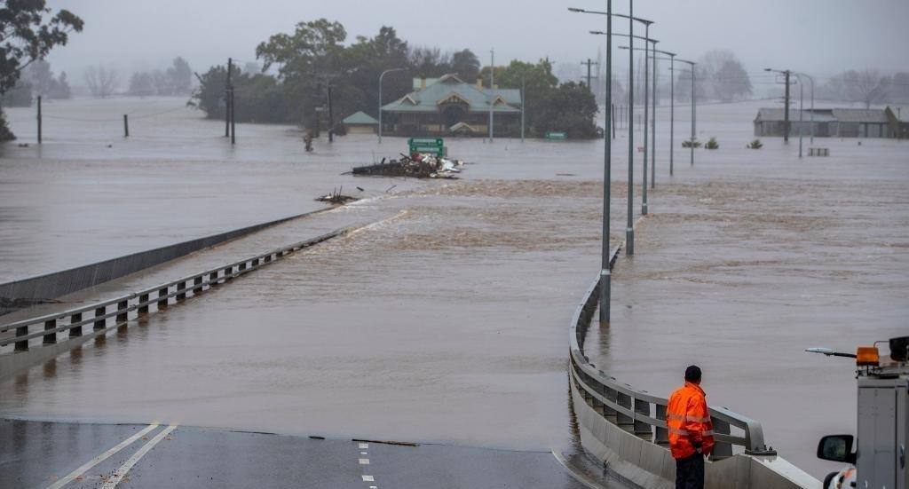 Tropical storm prompts life-threatening flash flooding warning in Australia