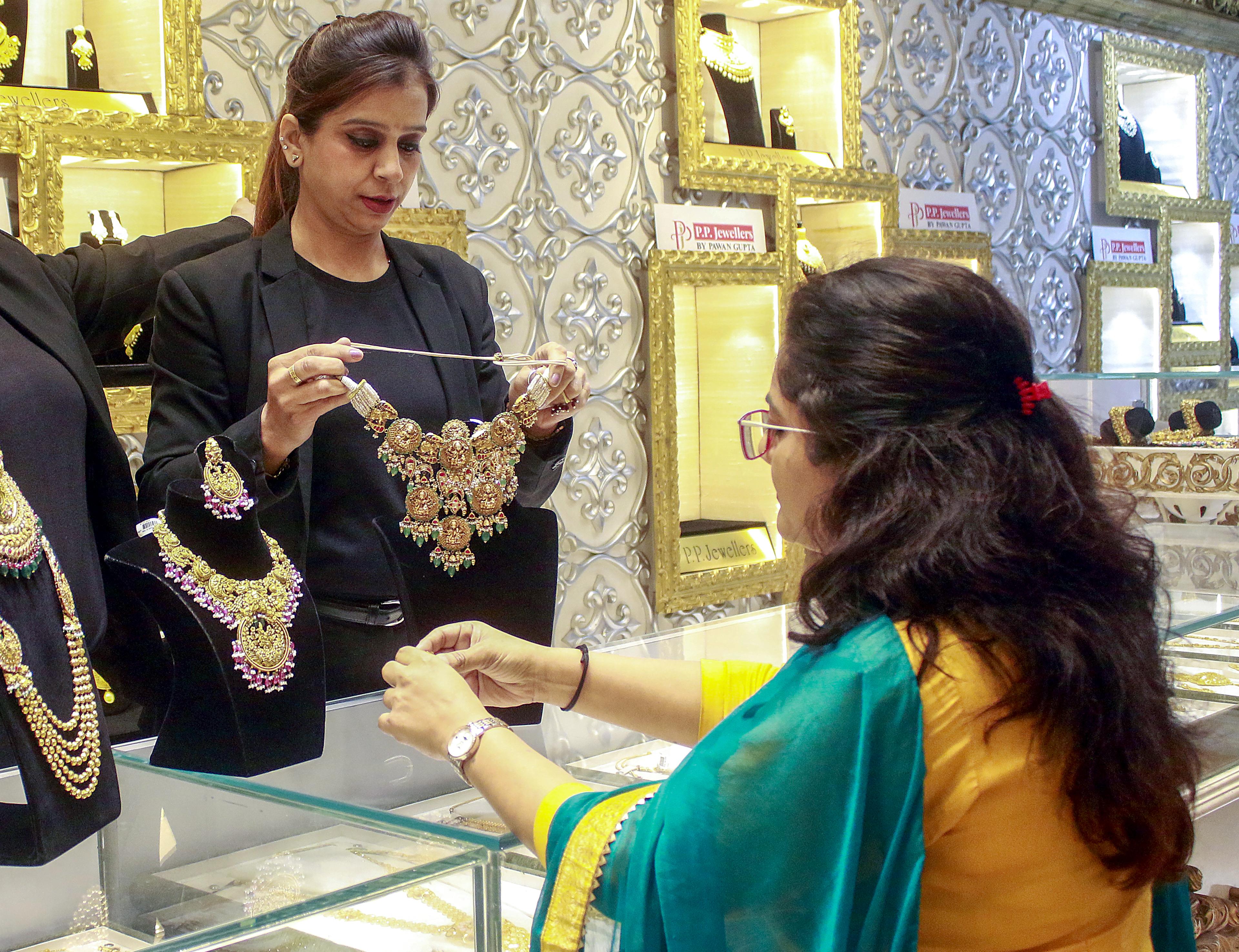 Gold prices soar over Rs 1,100 this week amid US tariff deal uncertainties