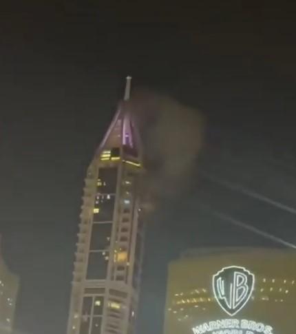 UAE air defences intercept Iranian missiles, debris hits tower in Dubai Marina