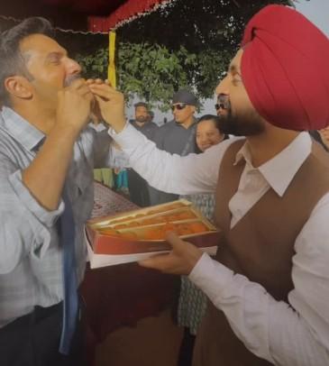 Diljit Dosanjh treats Varun Dhawan, Ahan Shetty with ladoos as ‘Border 2’ shoot concludes