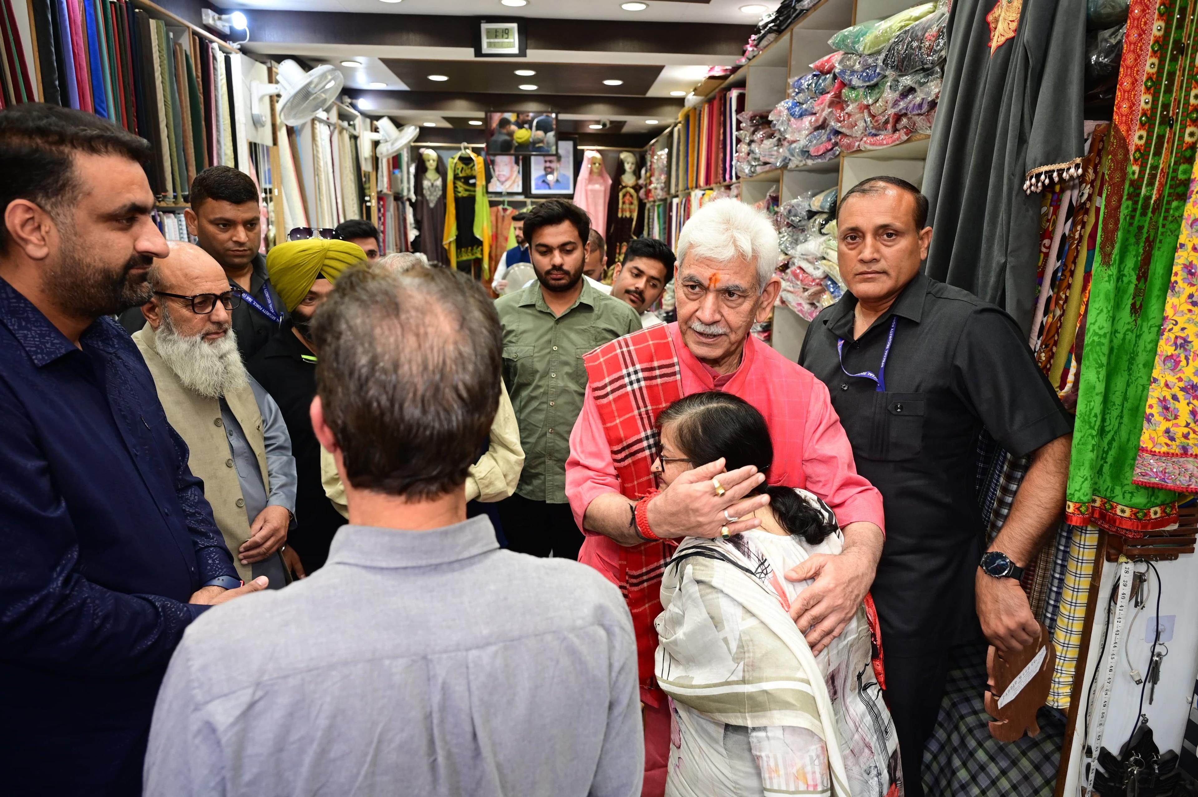 J&K Lt Governor Manoj Sinha visits Lal Chowk, interacts with traders