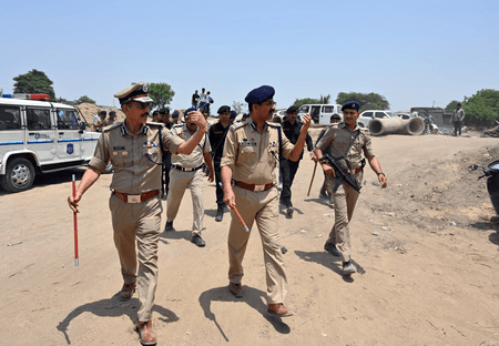 Gujarat Police bust liquor smuggling racket, seize bottles 10,000 hidden under helmets in truck