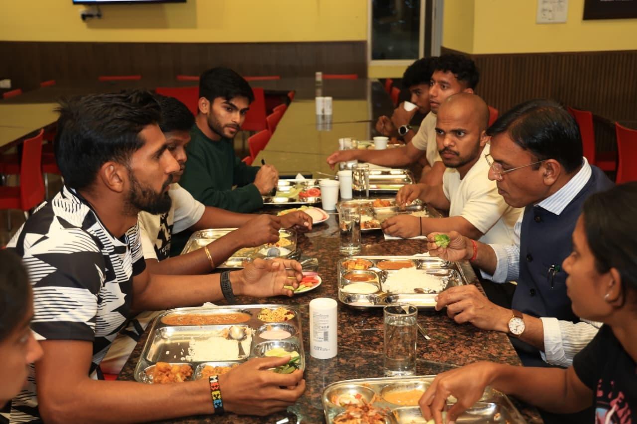 Sports Minister Dr. Mandaviya spends time at SAI NSSC, Bengaluru; shares a meal with athletes