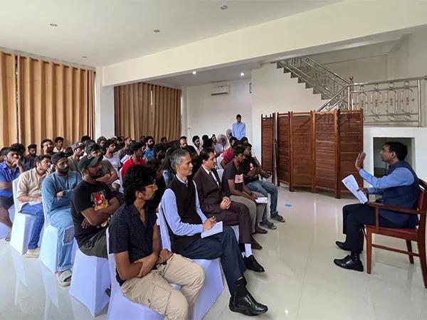 Ambassador Prashant Agrawal with rescued Indians