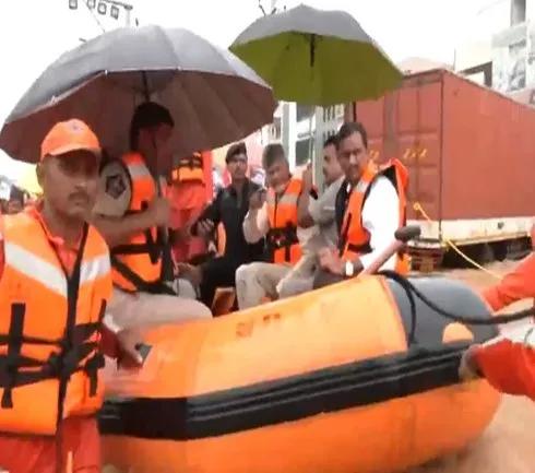 CM Chandrababu Naidu inspects the flood affected areas with officials in Vijayawada