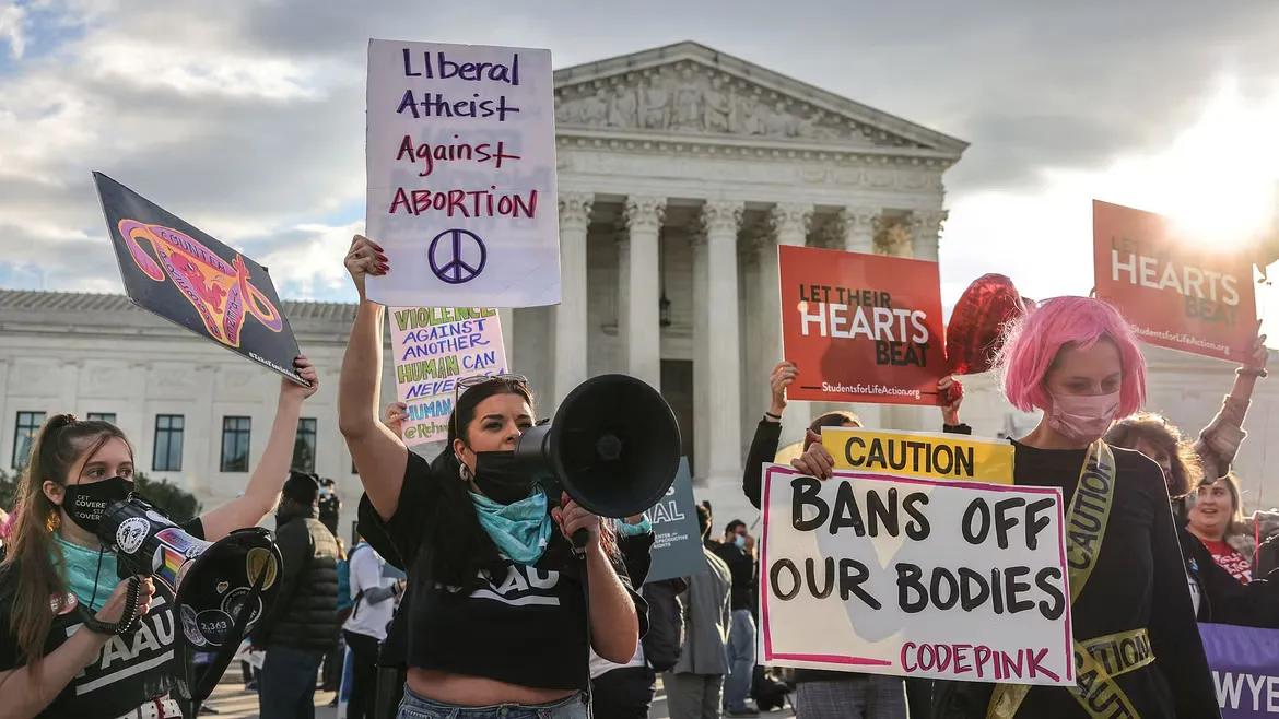 Pro-choice and anti-abortion both demonstrate outside the United States Supreme Court.