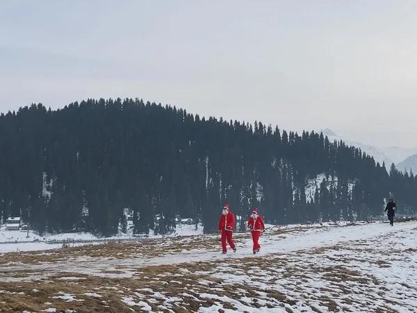 Tourist dressed as Santa Claus in Gulmarg on Christmas