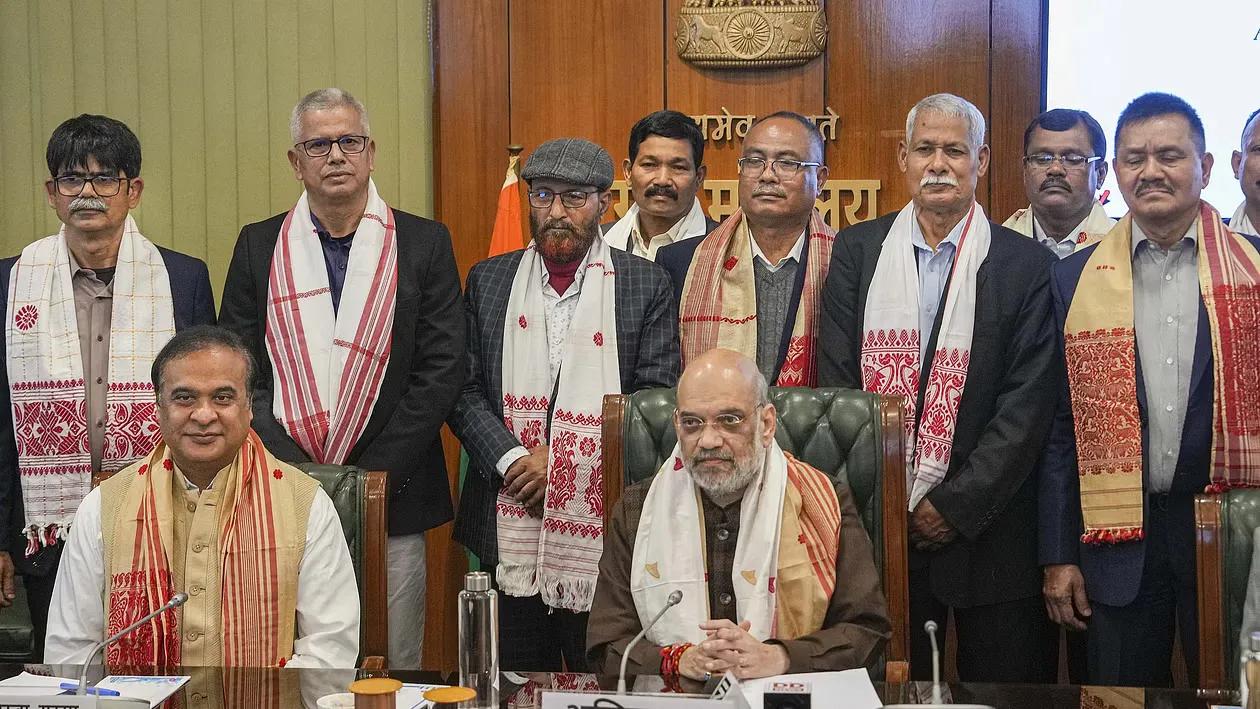 Union Home Minister Amit Shah and Assam Chief Minister Himanta Biswa Sarma with members of ULFA