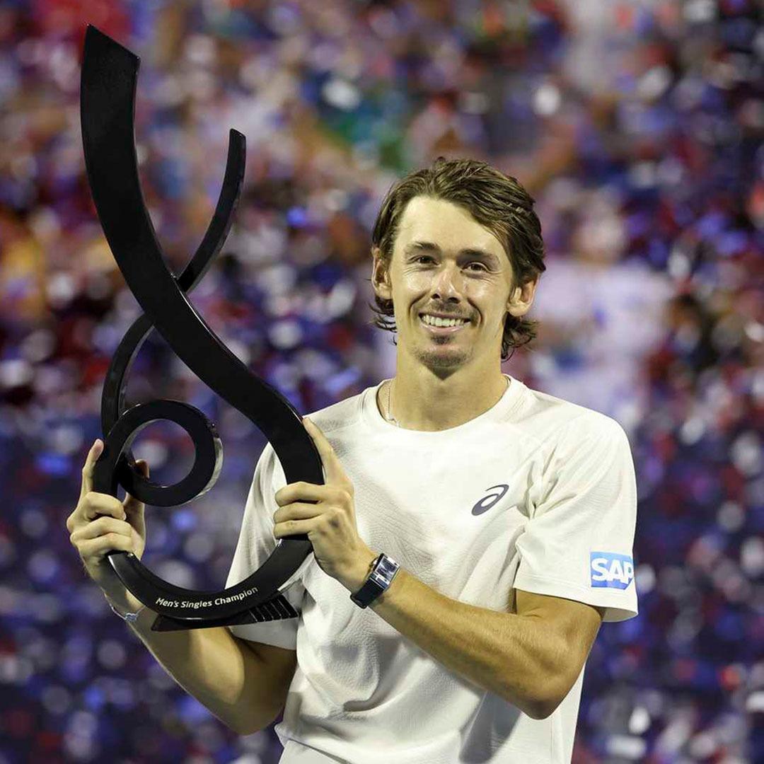 De Minaur saves 3 championship points to clinch Washington title