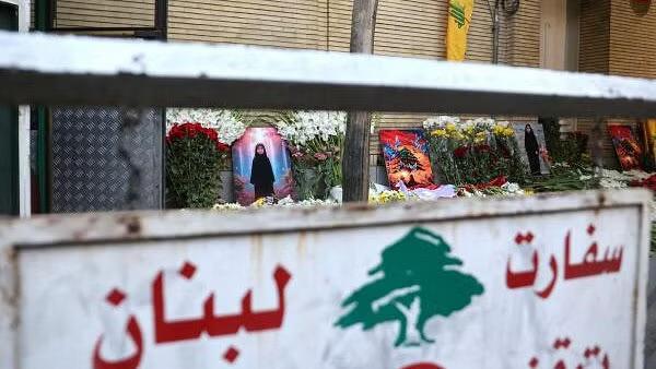 Flowers are kept on the gate of Lebanon's Embassy of Iran
