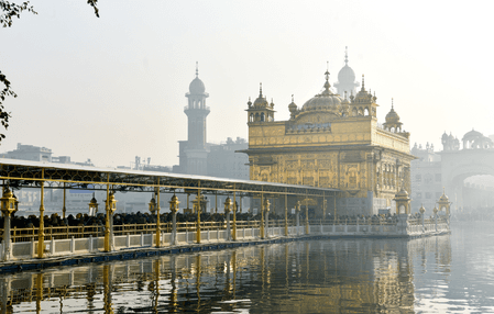 Braving biting cold, devotees throng Golden Temple, shrines to usher in New Year