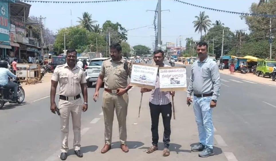 K’taka court sentences man to public service; holding traffic rules sign for safety awareness