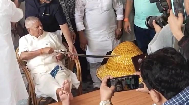 Lalu Yadav's sword cut on birthday cake sparks political war of words