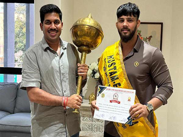 Wrestler Sikandar Shaikh with Rustam-E-Hind trophy
