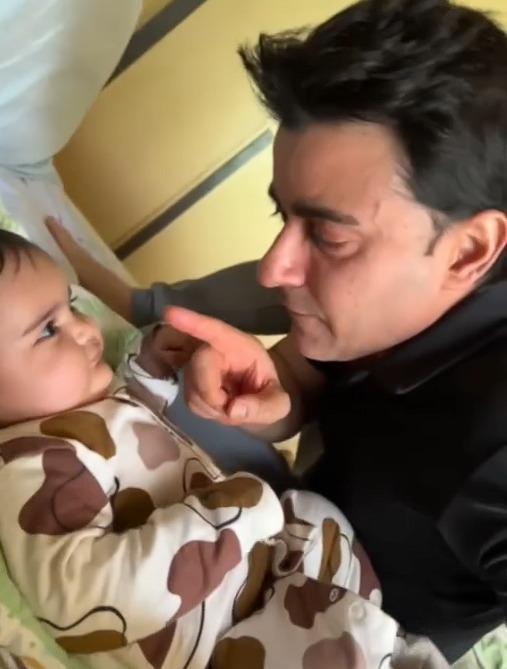 Gautam Rode enjoys a cute fight with his little bundle of joy