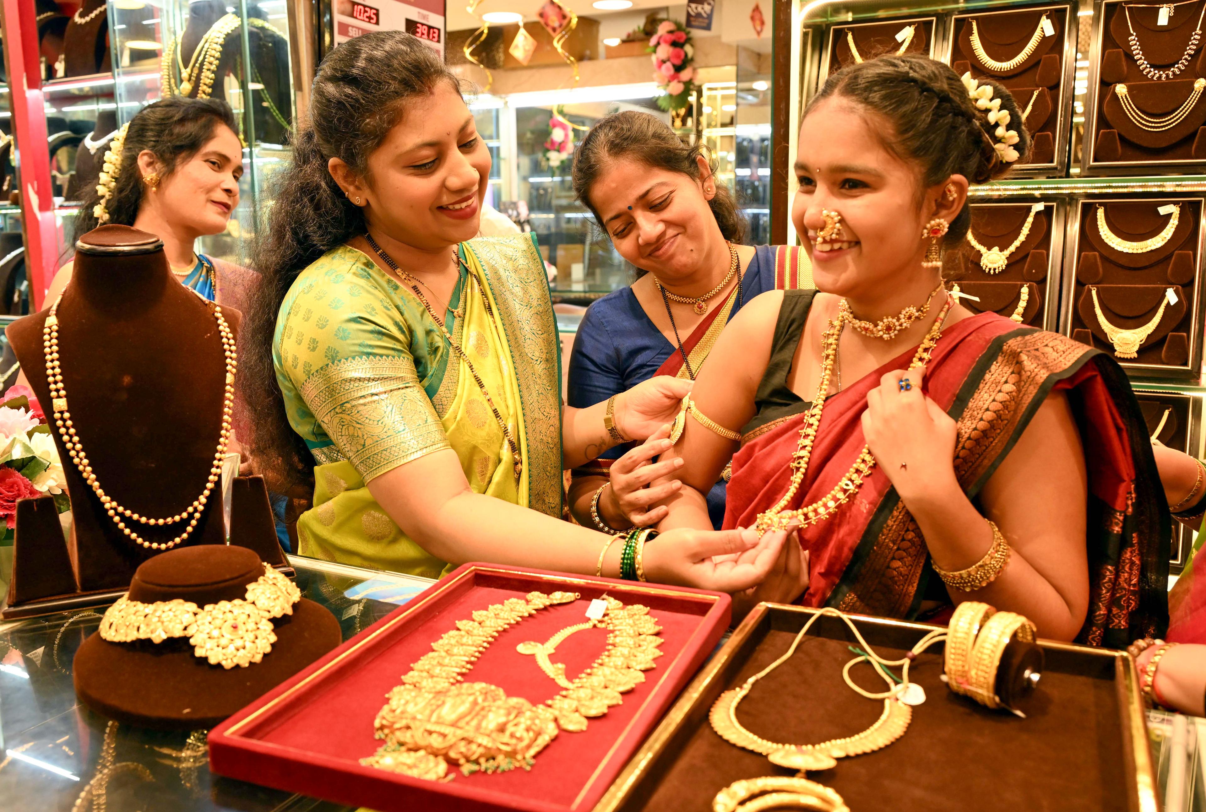 Gold prices jump over 4 pc to hit record high