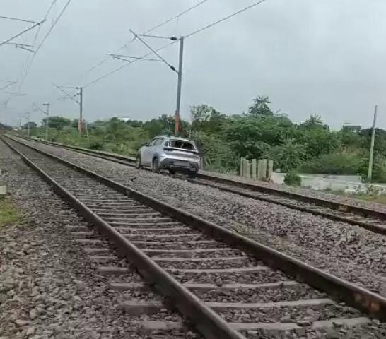 Woman drives car on railway track in Telangana