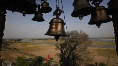 Devotees Perform Puja at Restored Hindu Temple